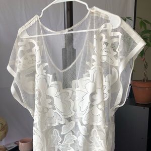 Sheer, white, floral print top.